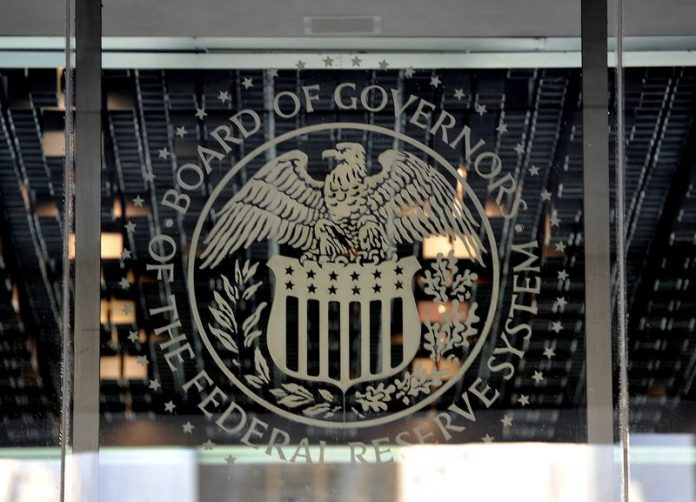 The US Federal Reserve emblem is seen on